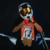 Model wearing the Mary Tee at night next to a dirt bike